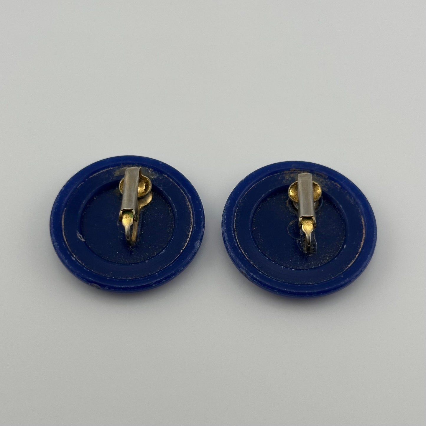 Vintage Plastic Clip-On Earrings, Dark Blue with Gold-Tone Back.