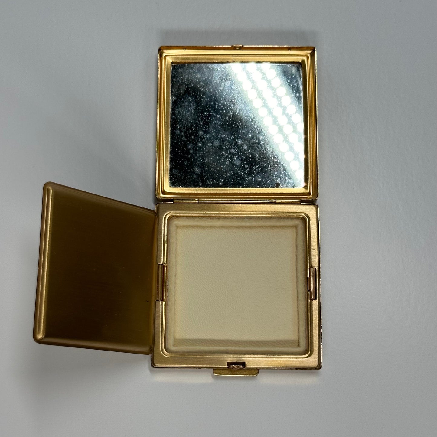 Vintage Compact by Majestic in Gold Textured Design.
