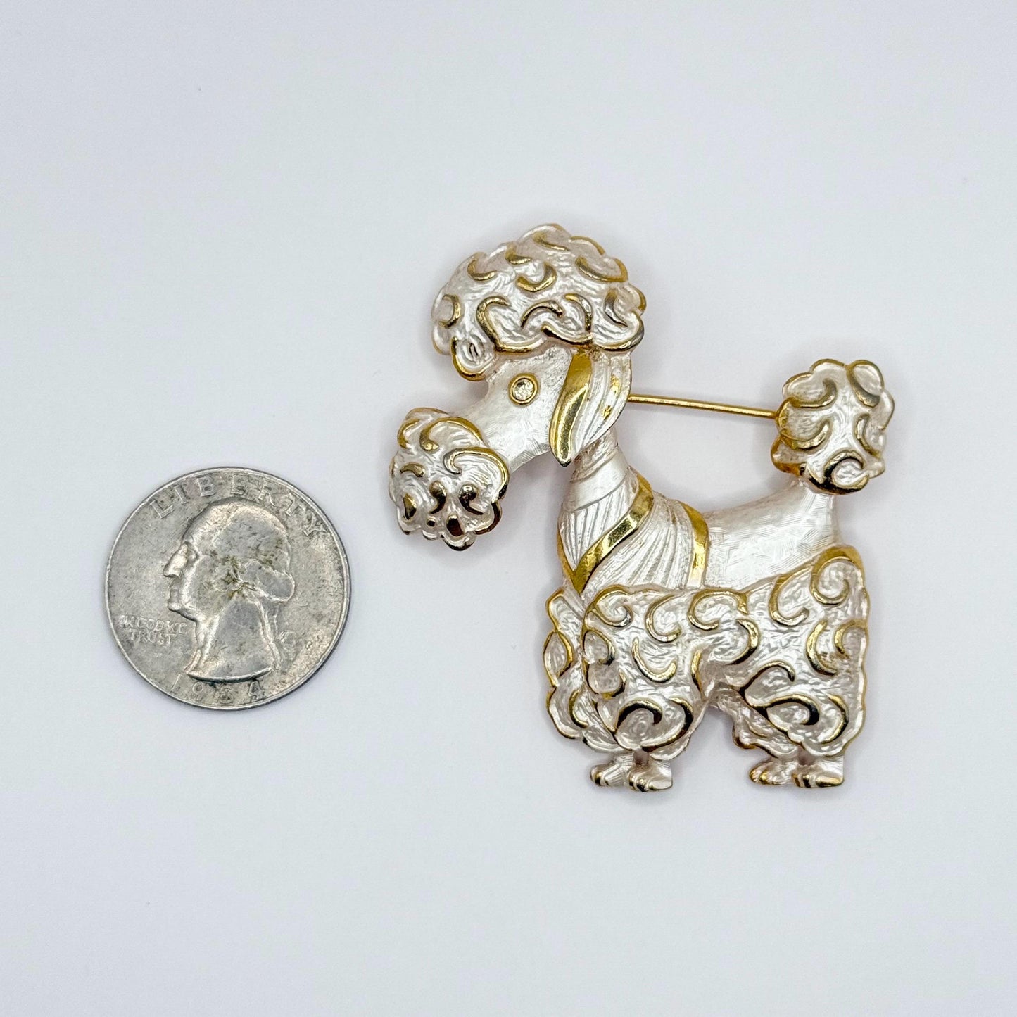 Vintage Brooch of Poodle in Gold Tone White Enamel and Rhinestone Eye by Parklane