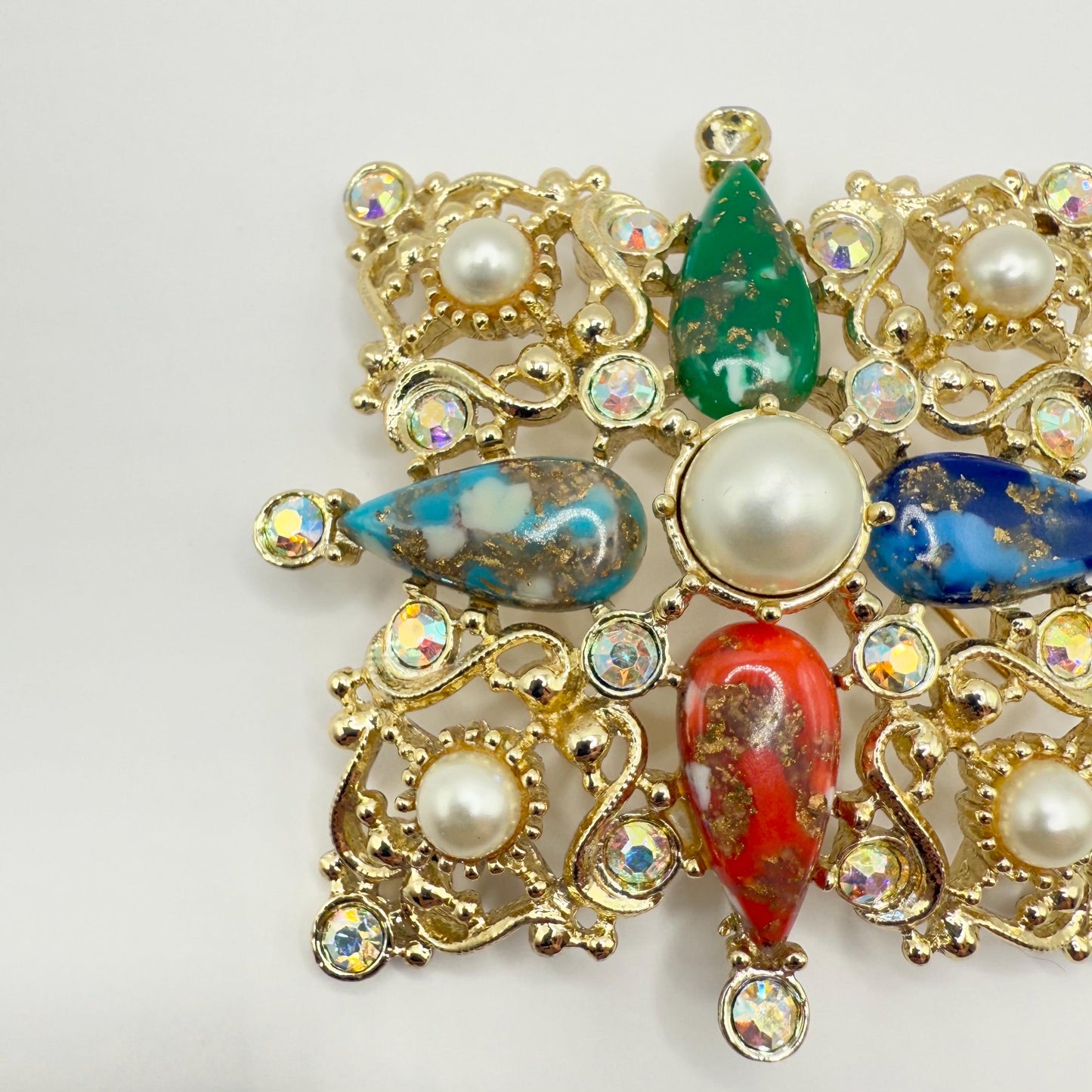 Vintage Brooch by Sarah Coventry of Maltese Cross in Gold Tone Rhinestone Lucite Pin