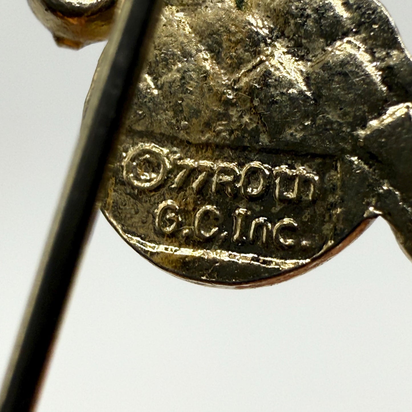 Vintage Stickpin of Girl on Bike With Flower Basket Detail
