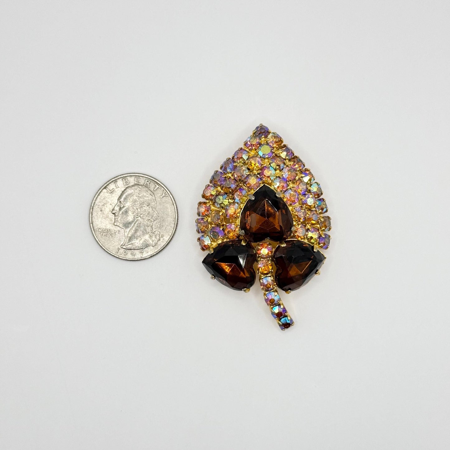 Vintage Brooch of Gold Tone Leaf with Iridescent and Brown Rhinestones