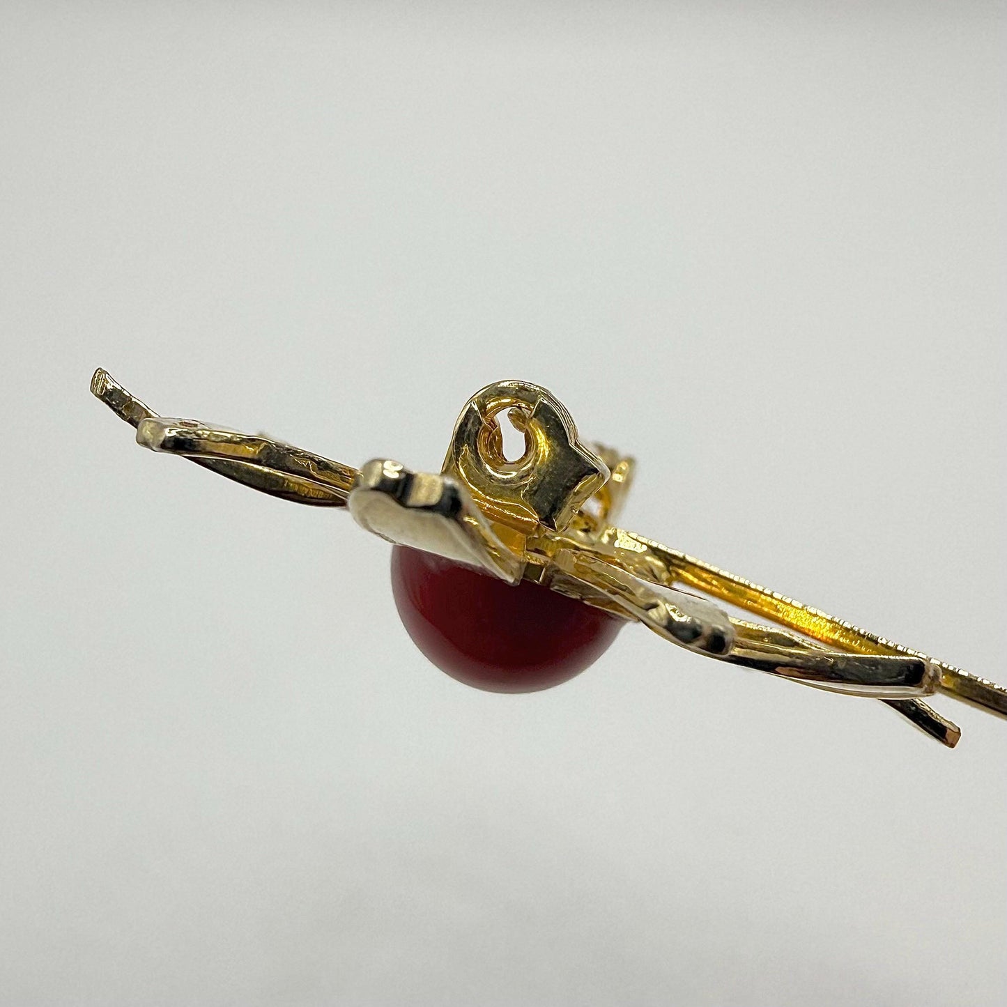 Vintage Metal Daisy Brooch in Gold Tone with Red Enamel Center
