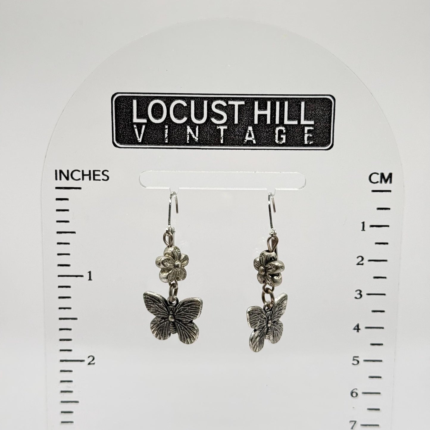 Metal Dangle Earrings in Silver Tone with Flower and Butterfly Design