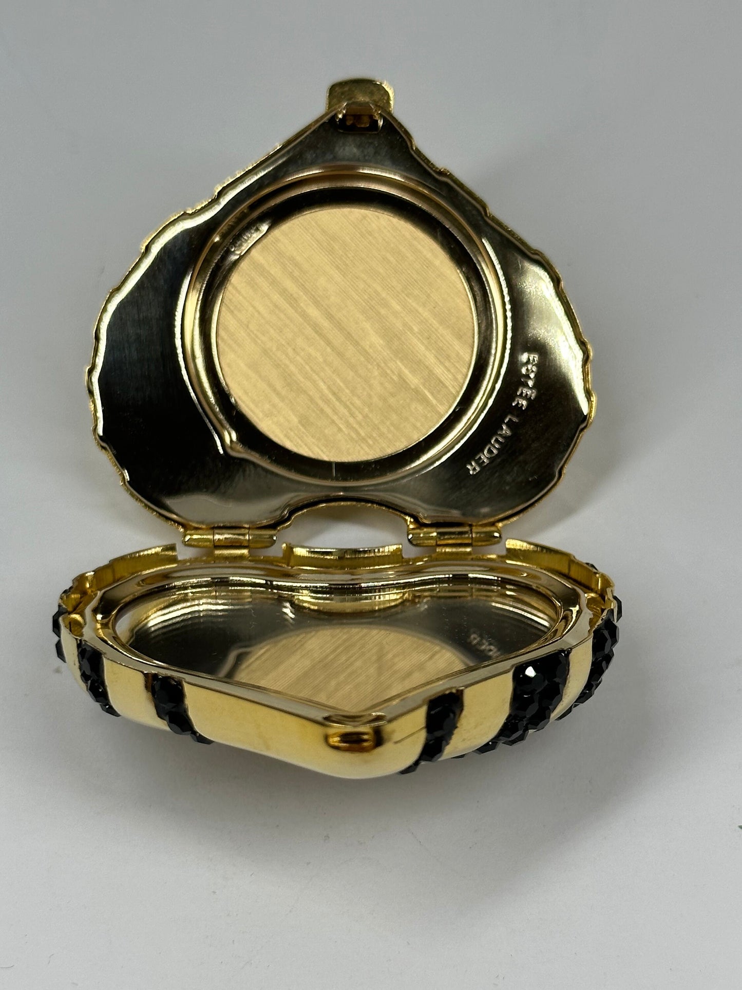 Vintage Compact, Heart Shaped with Black Swarovski Crystals by Estée Lauder.