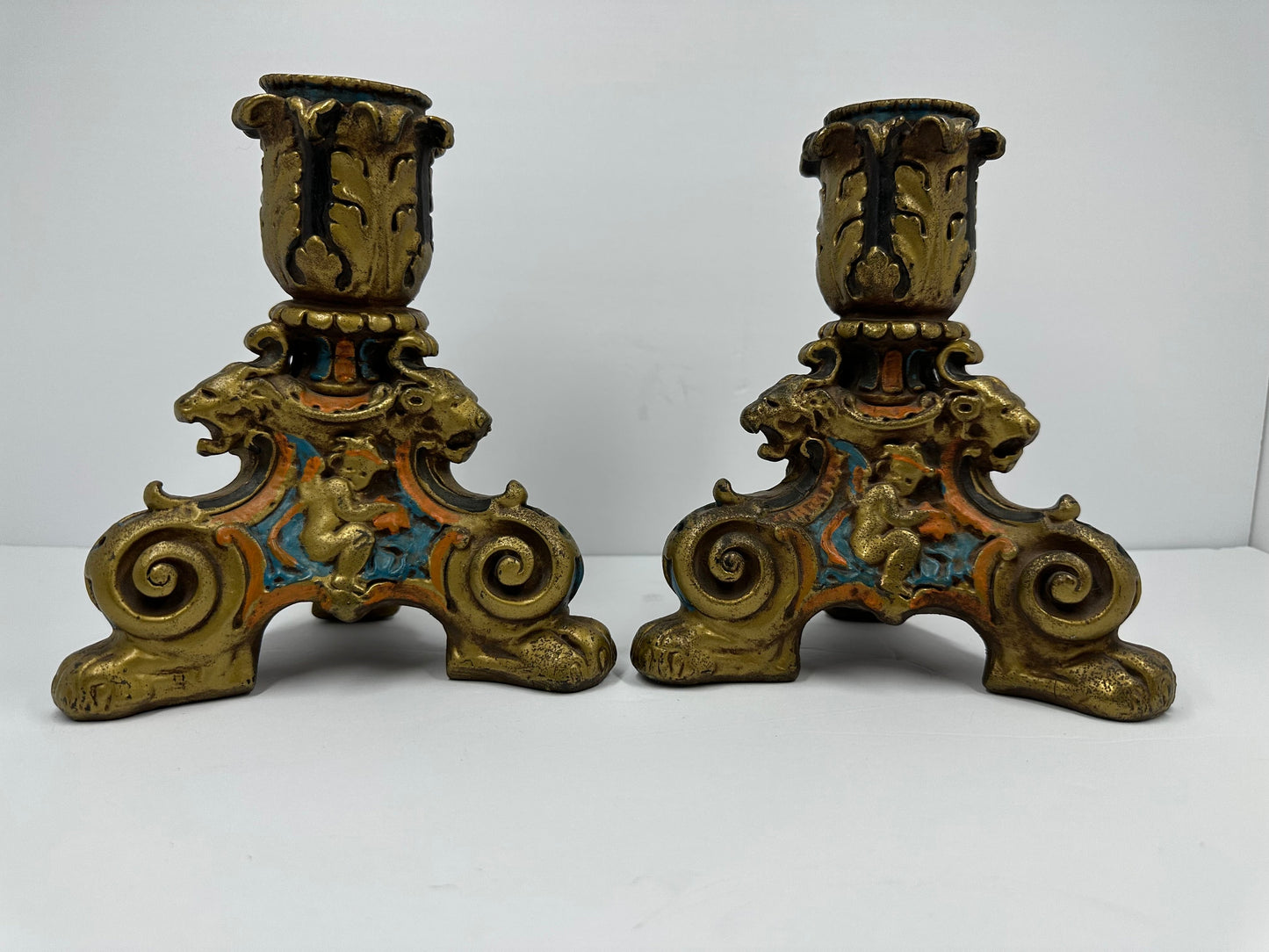 Vintage Candlestick Holders, Hand Painted with Cherubs and Lions. Heavy!