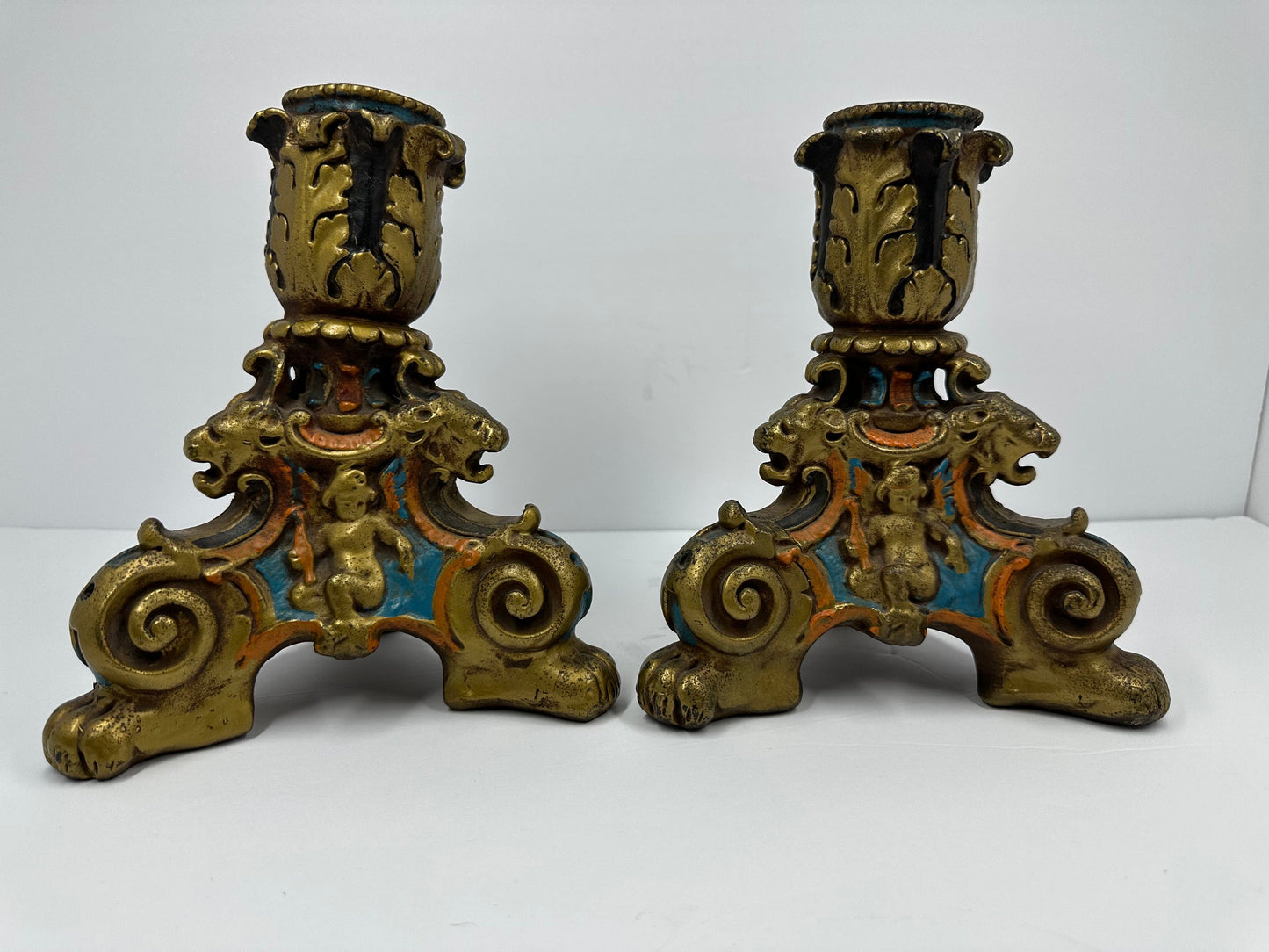Vintage Candlestick Holders, Hand Painted with Cherubs and Lions. Heavy!