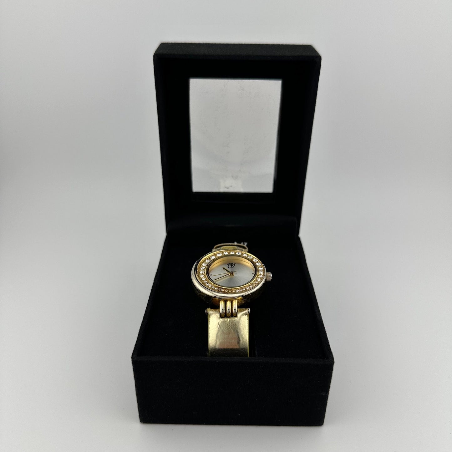 Vintage Elizabeth Taylor White Diamonds Gold Tone Watch with Faux Leather Strap.
