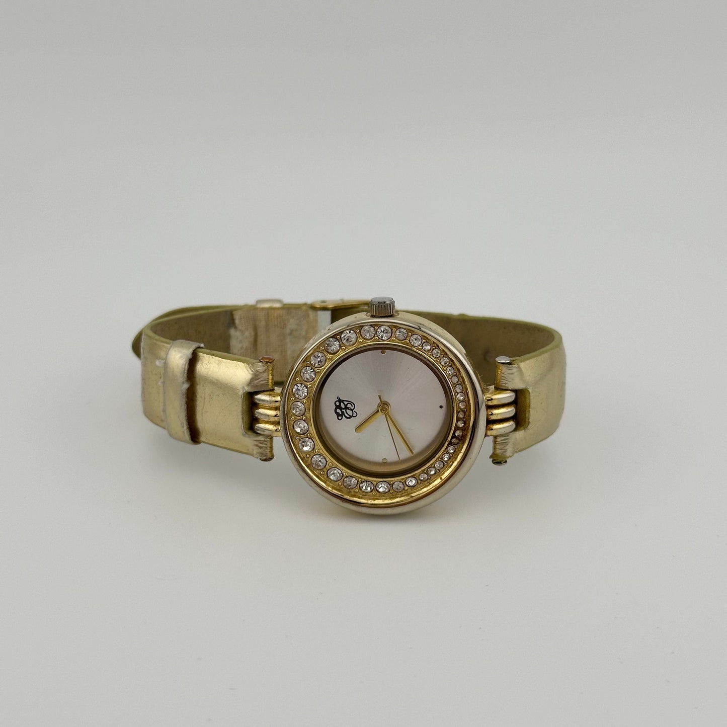 Vintage Elizabeth Taylor White Diamonds Gold Tone Watch with Faux Leather Strap.
