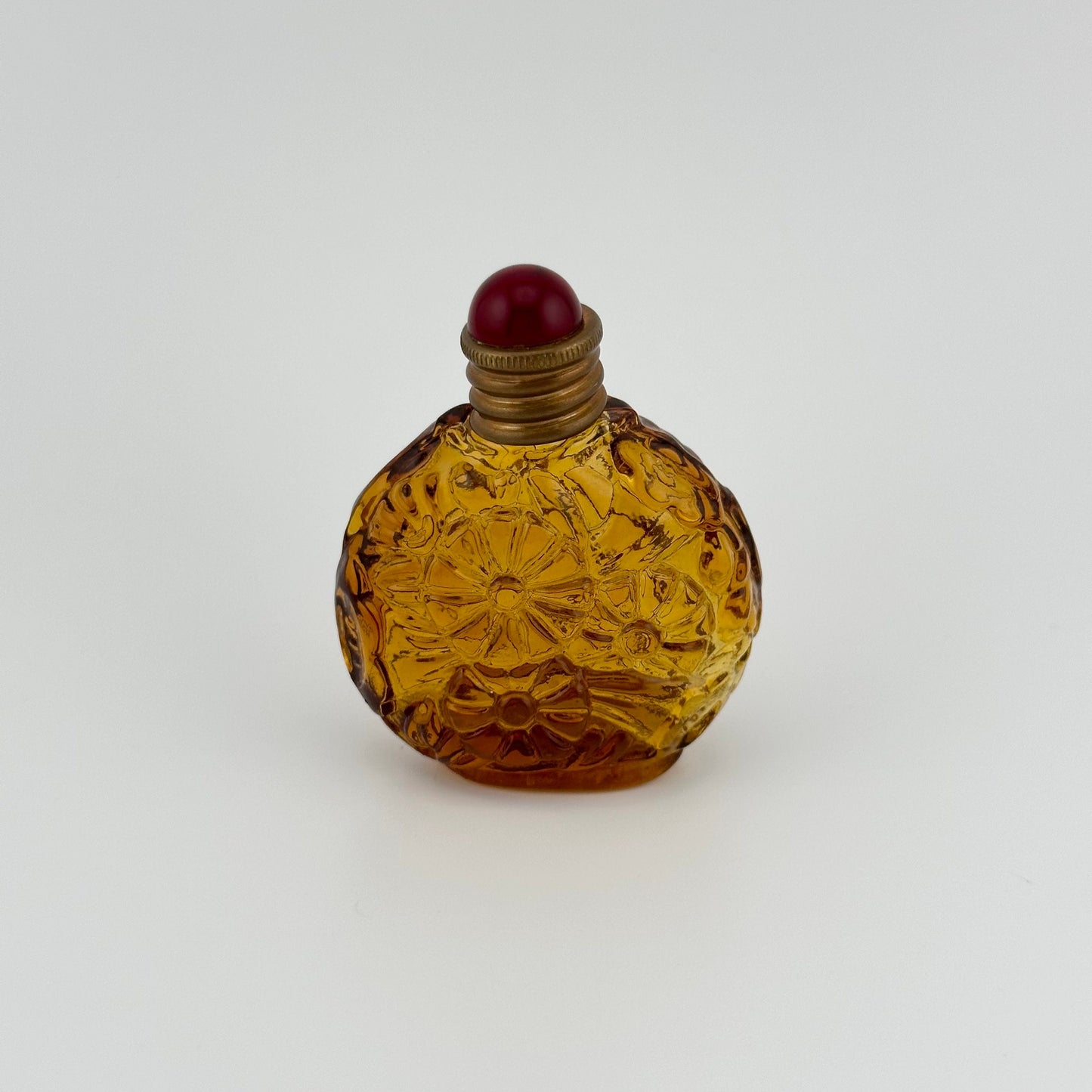 Vintage Perfume Bottle, Amber Art Deco Glass with Floral Design.