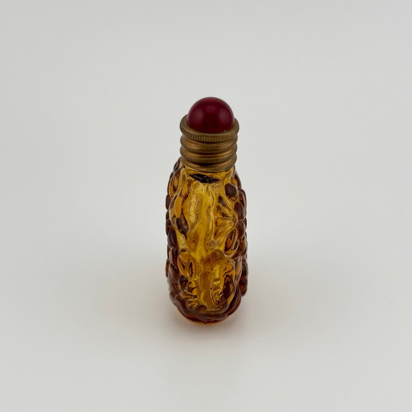 Vintage Perfume Bottle, Amber Art Deco Glass with Floral Design.