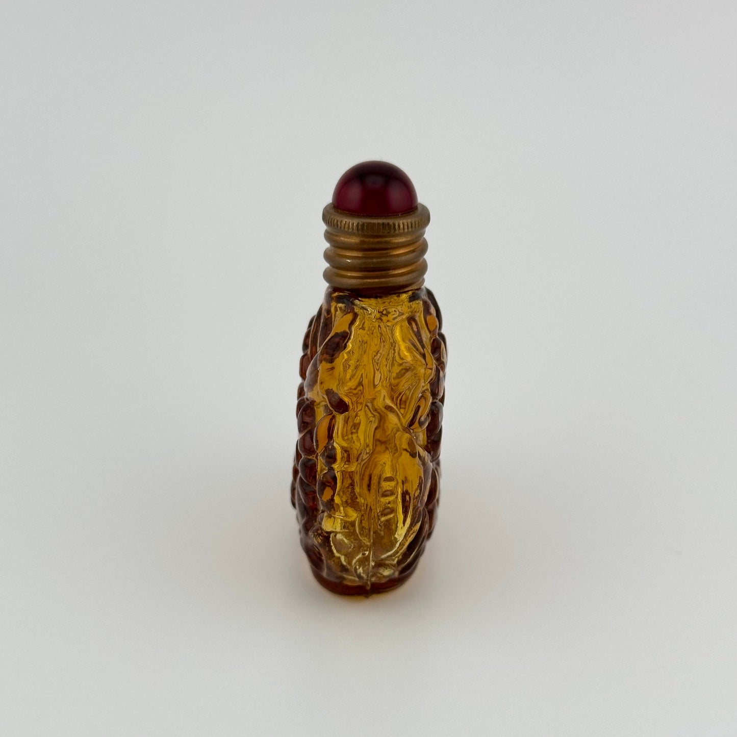 Vintage Perfume Bottle, Amber Art Deco Glass with Floral Design.