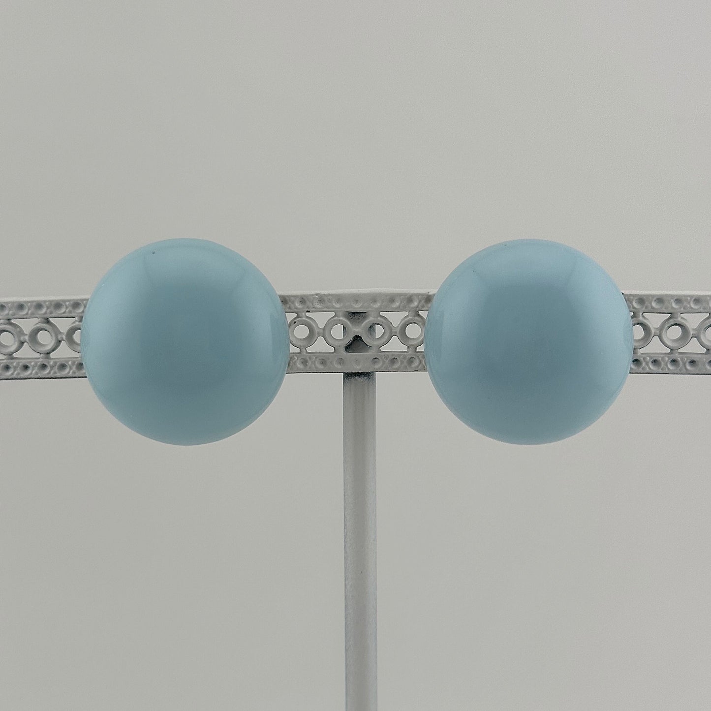 Vintage Plastic Clip-On Earrings, Light Blue with Gold Back.