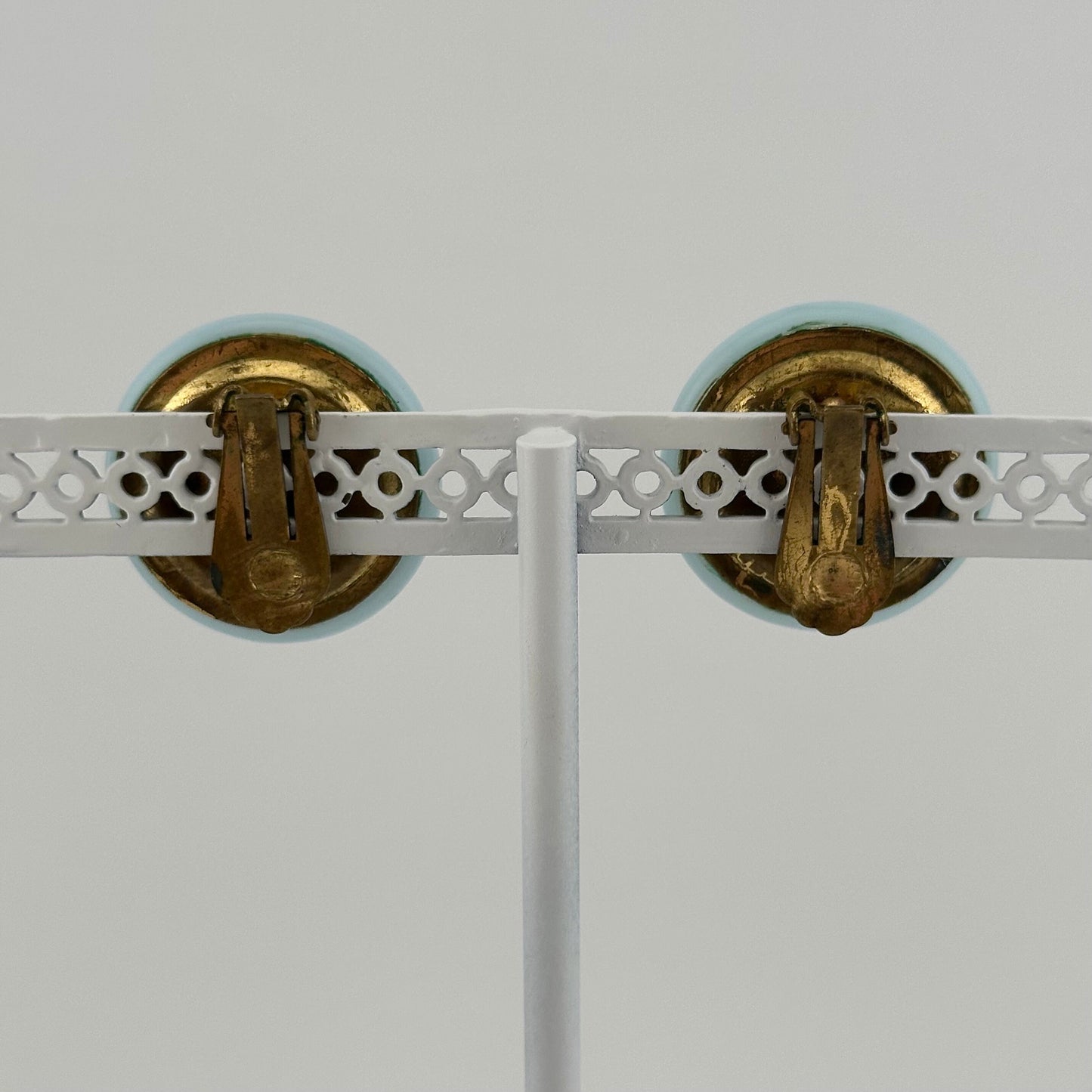 Vintage Plastic Clip-On Earrings, Light Blue with Gold Back.