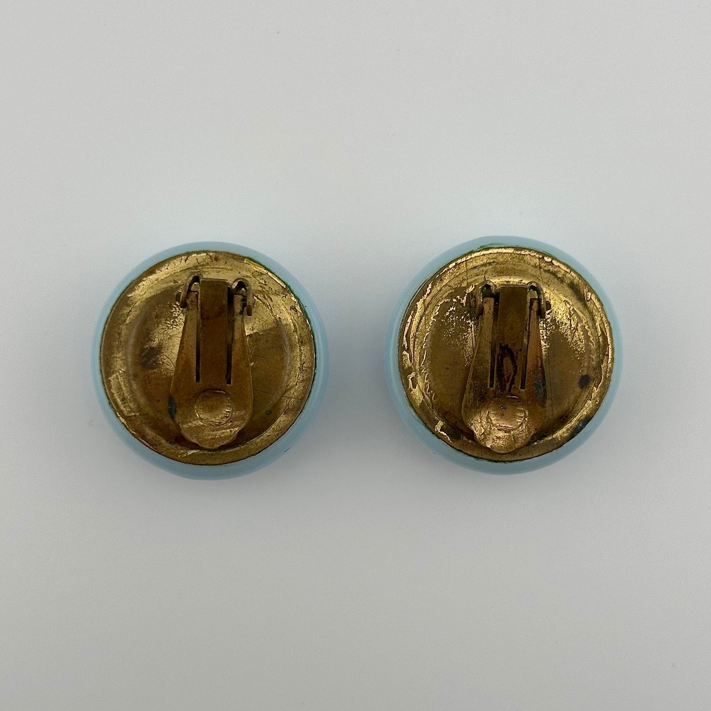 Vintage Plastic Clip-On Earrings, Light Blue with Gold Back.