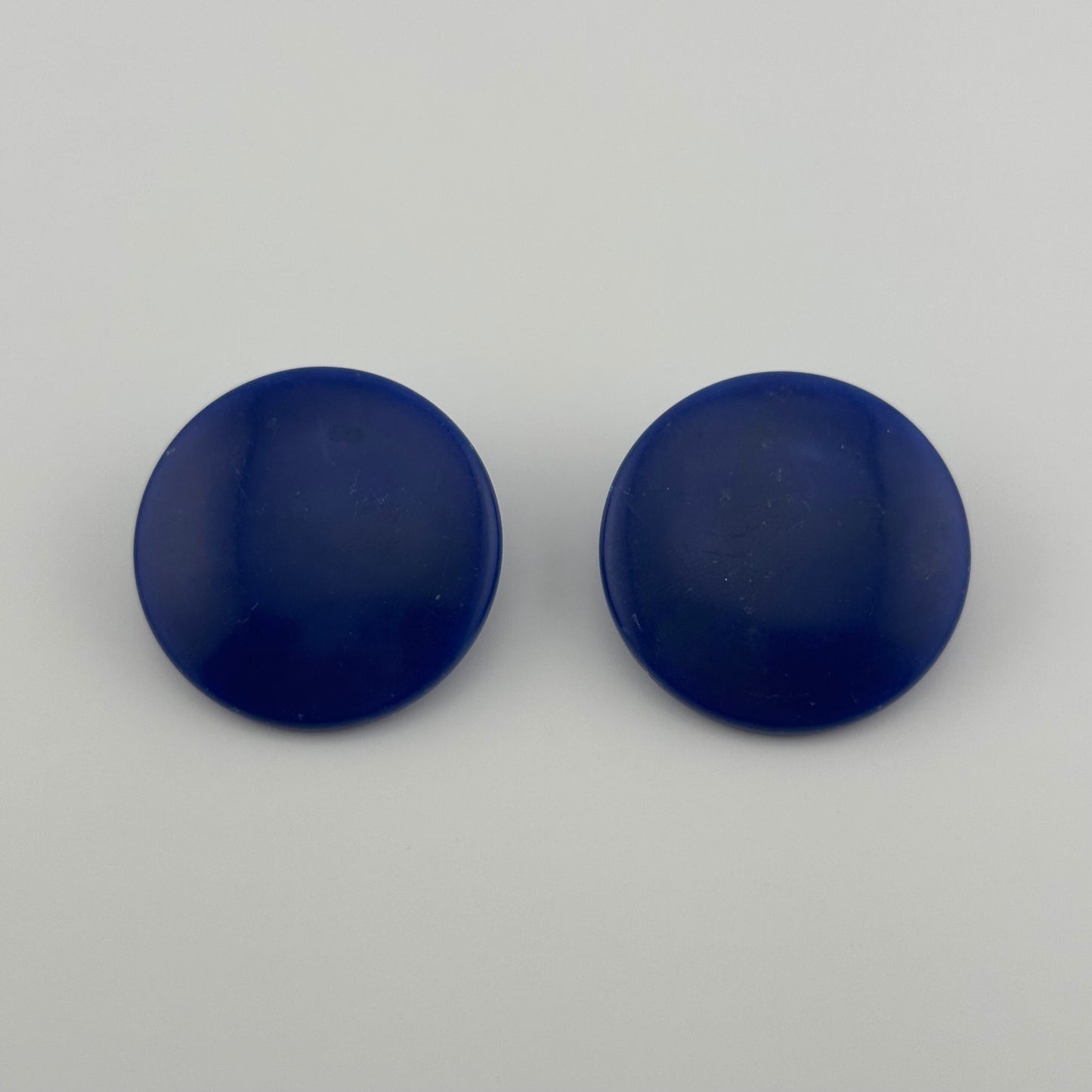Vintage Plastic Clip-On Earrings, Dark Blue with Gold-Tone Back.