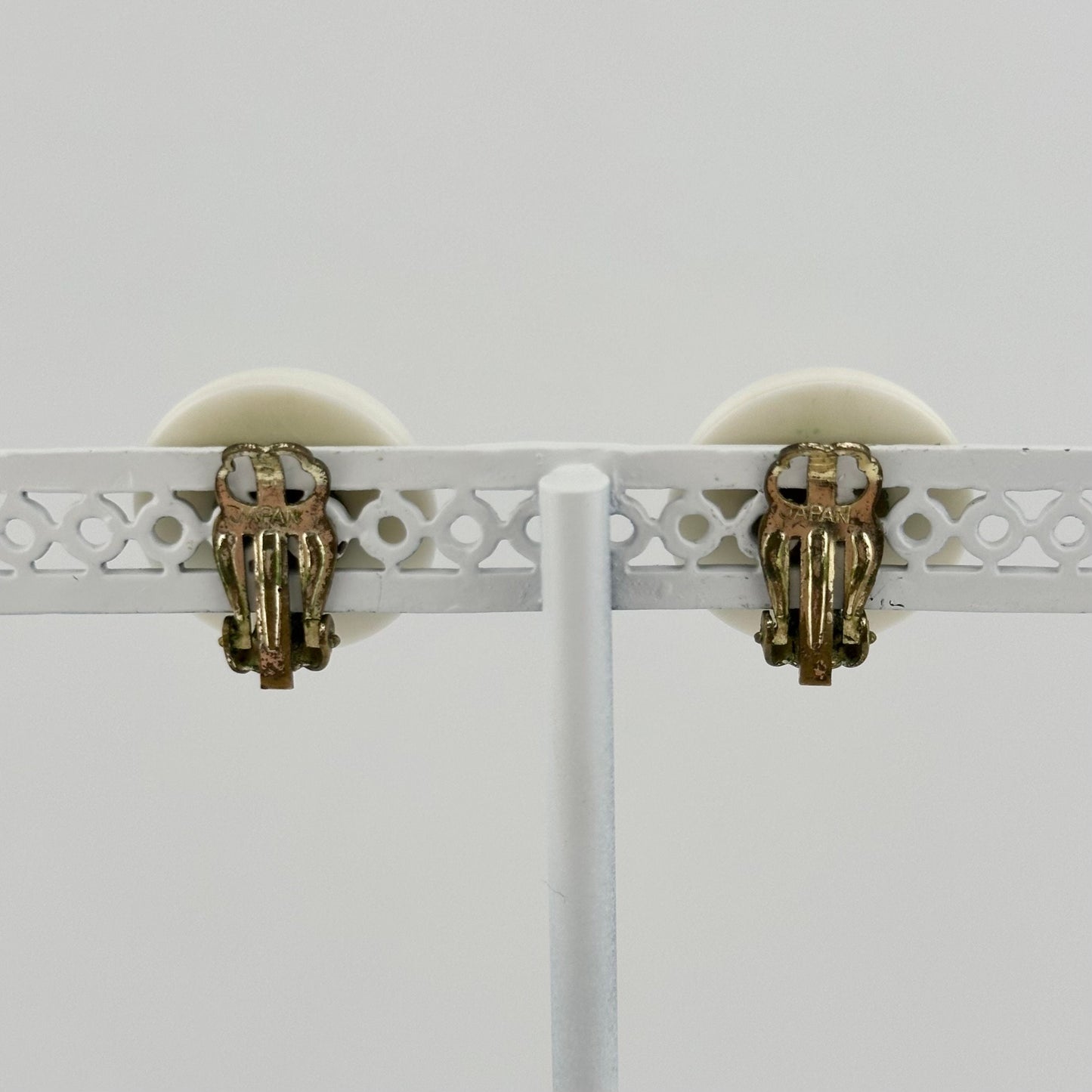Vintage Plastic Clip-On Earrings, White with Gold-Tone Back, Made in Japan.