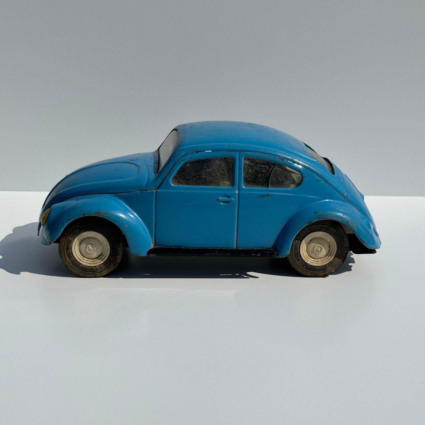 Vintage Metal Car of a Volkswagen Beetle by Tonya