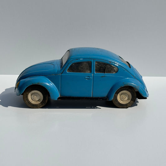 Vintage Metal Car of a Volkswagen Beetle by Tonya