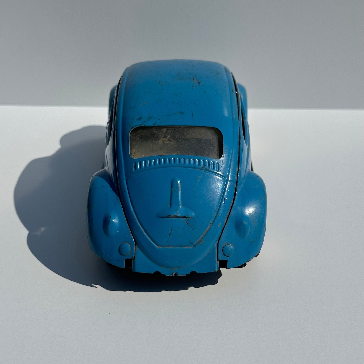 Vintage Metal Car of a Volkswagen Beetle by Tonya