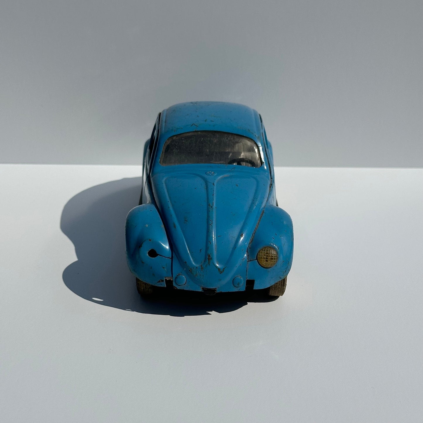 Vintage Metal Car of a Volkswagen Beetle by Tonya