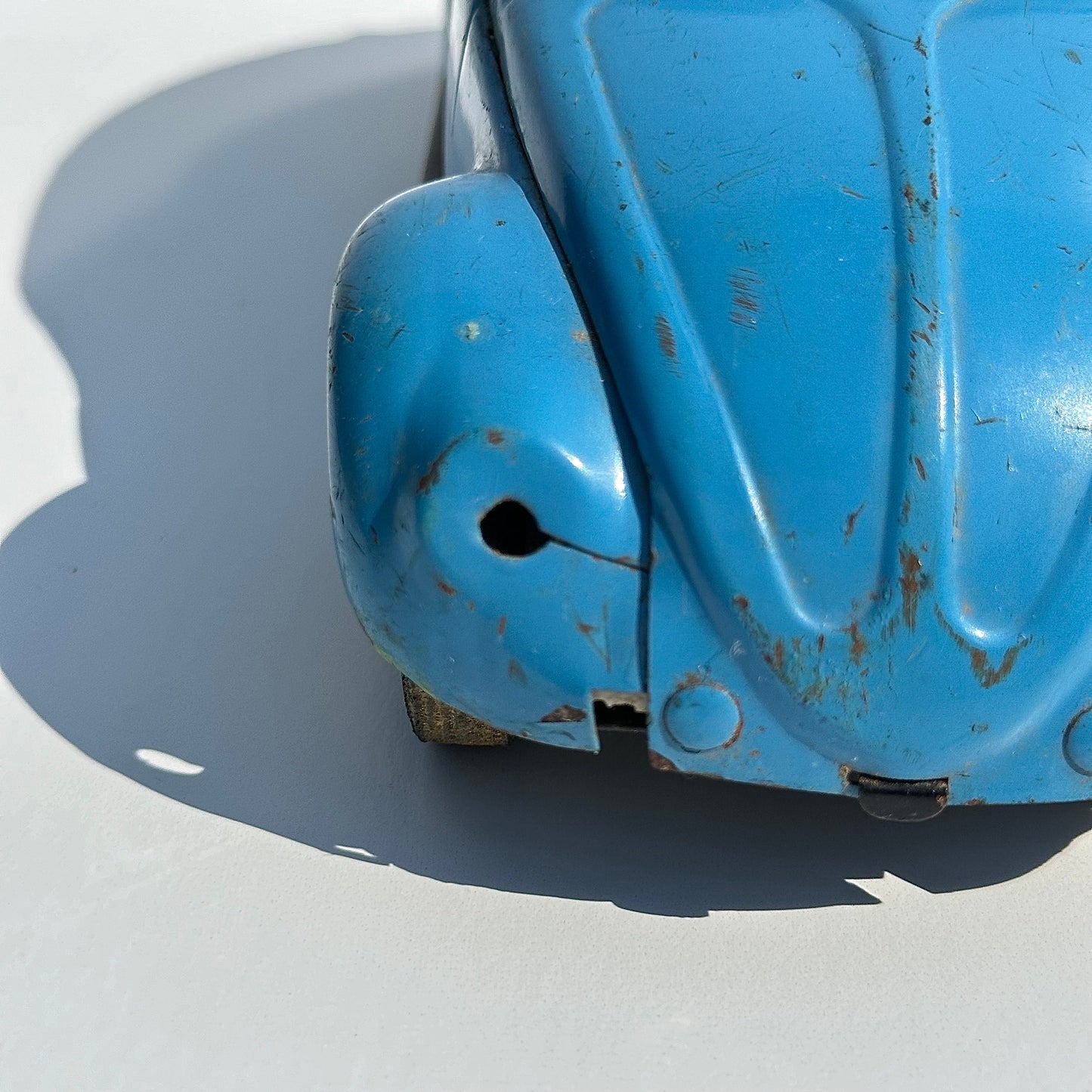 Vintage Metal Car of a Volkswagen Beetle by Tonya