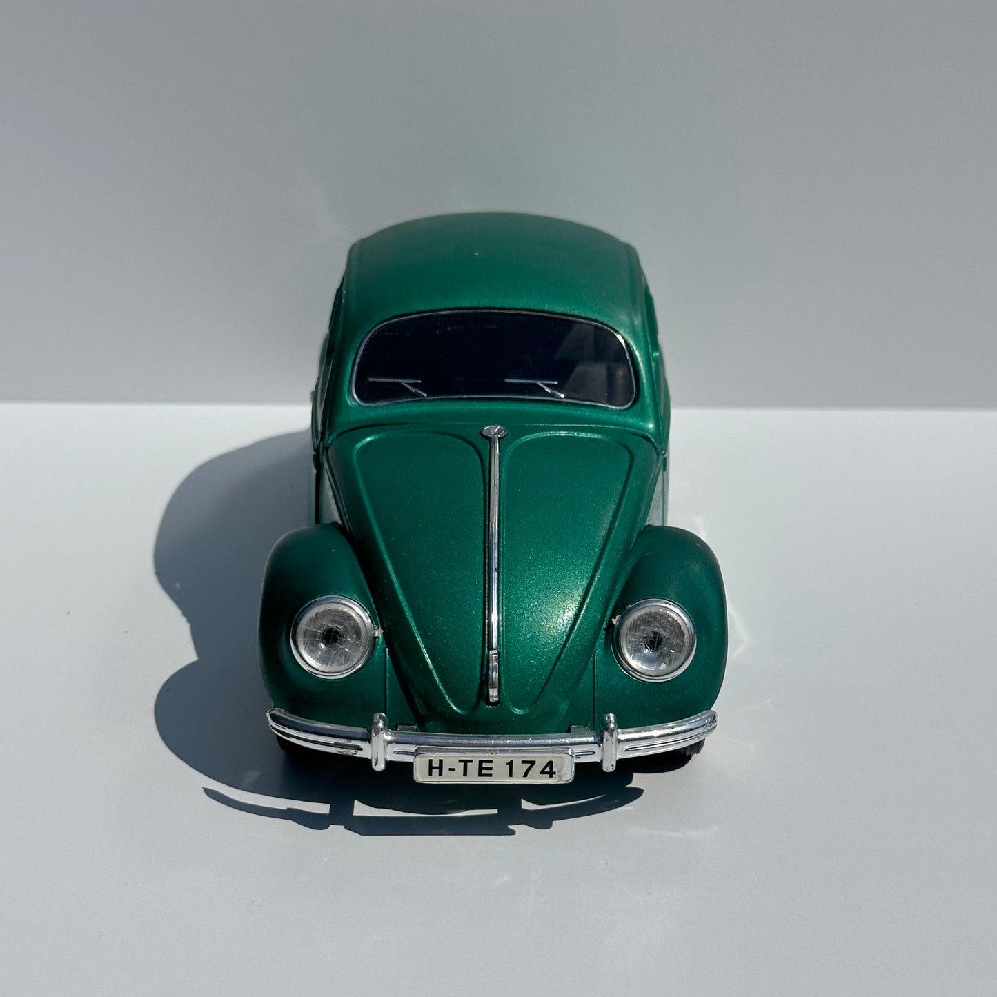 Vintage Die-Cast Model Car of a Green Volkswagen Beetle Echella Solido and Made in France.