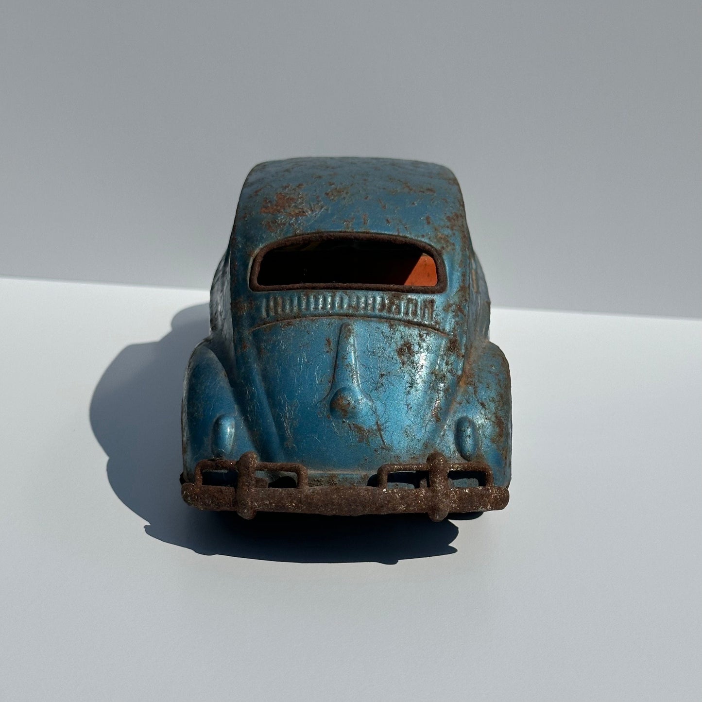Vintage Car of a Blue Volkswagen Beetle and Made in Japan 1960s