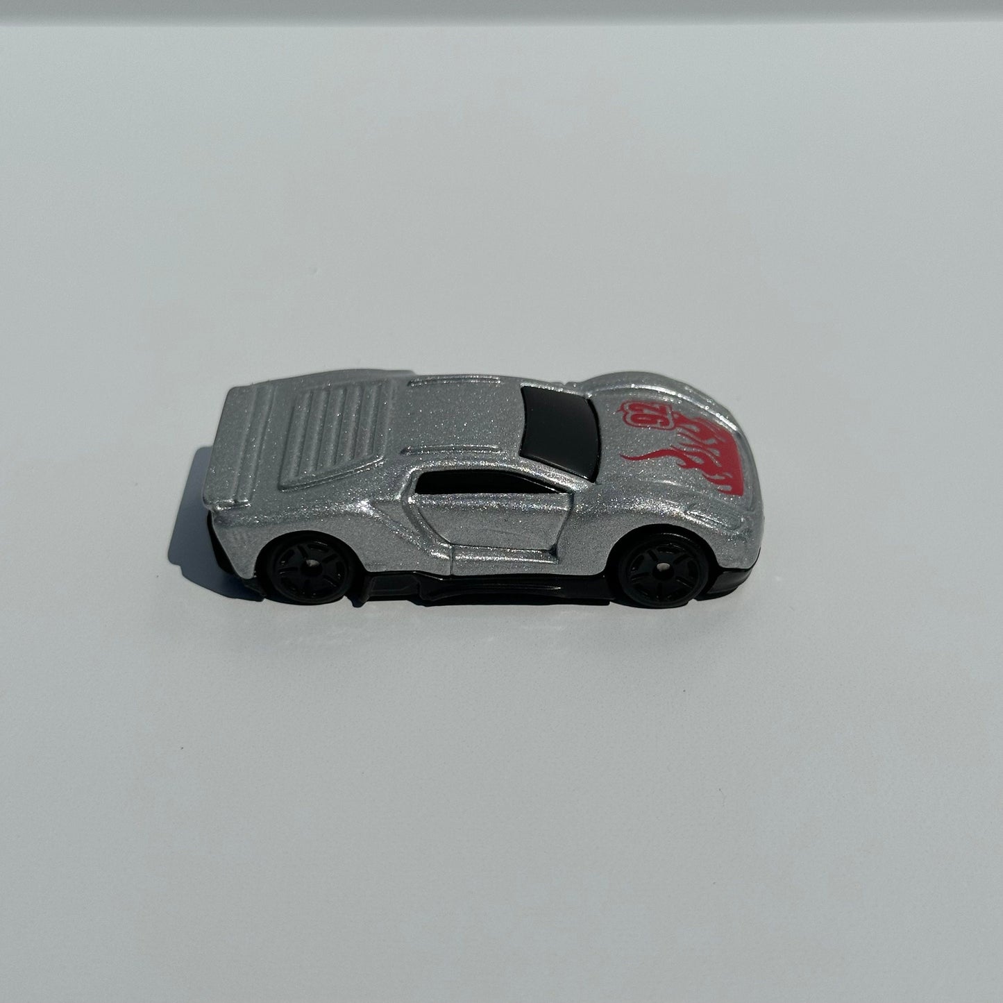 Vintage Car of Silver Maisto Lamborghini Number 92 with Red Flames.