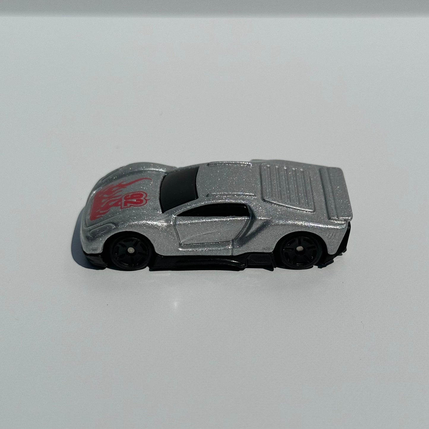 Vintage Car of Silver Maisto Lamborghini Number 92 with Red Flames.