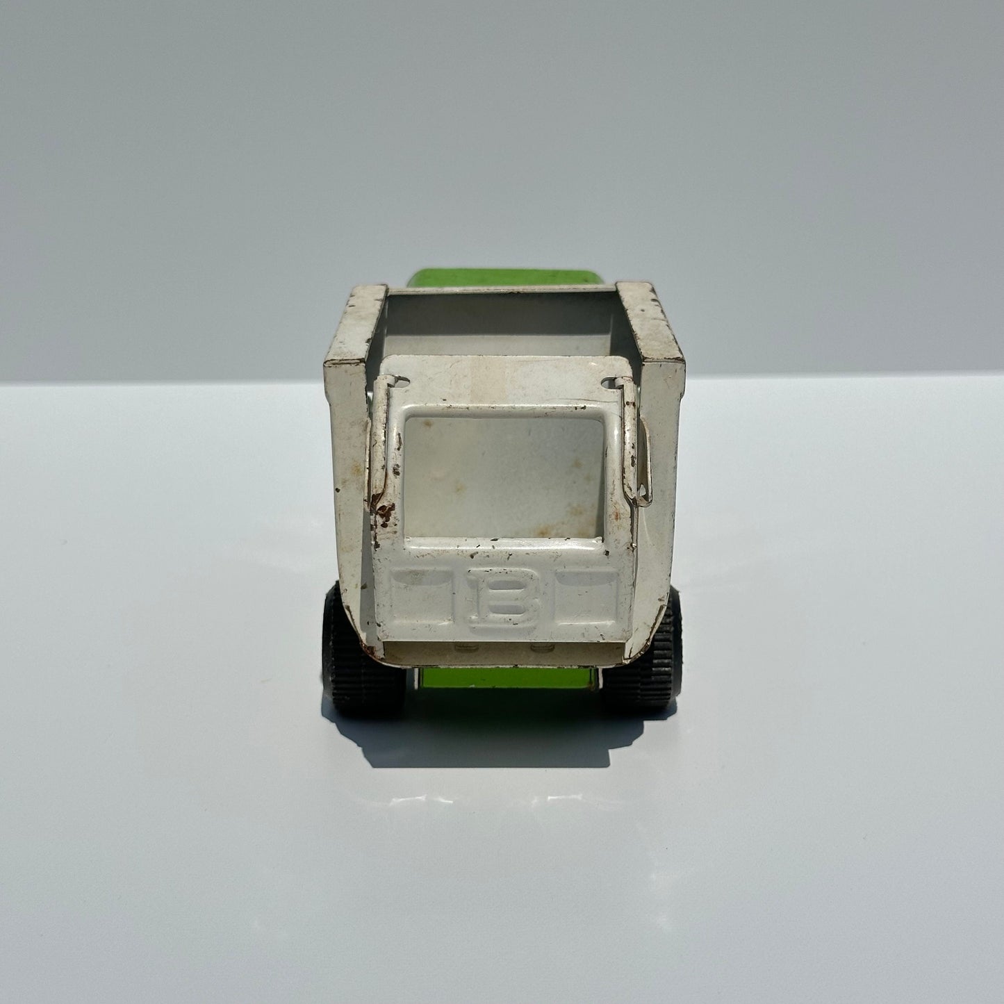 Vintage Green Dump Truck in Pressed Steel by Buddy L. and Made in Japan.