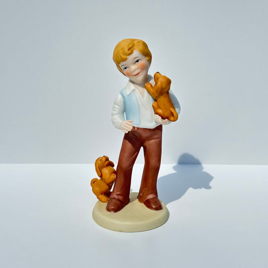 Vintage Porcelain Figurine of Boy with Puppies by Avon 1981 Collectible