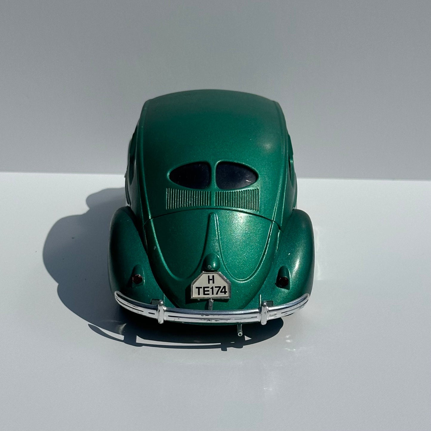Vintage Die-Cast Model Car of a Green Volkswagen Beetle Echella Solido and Made in France.