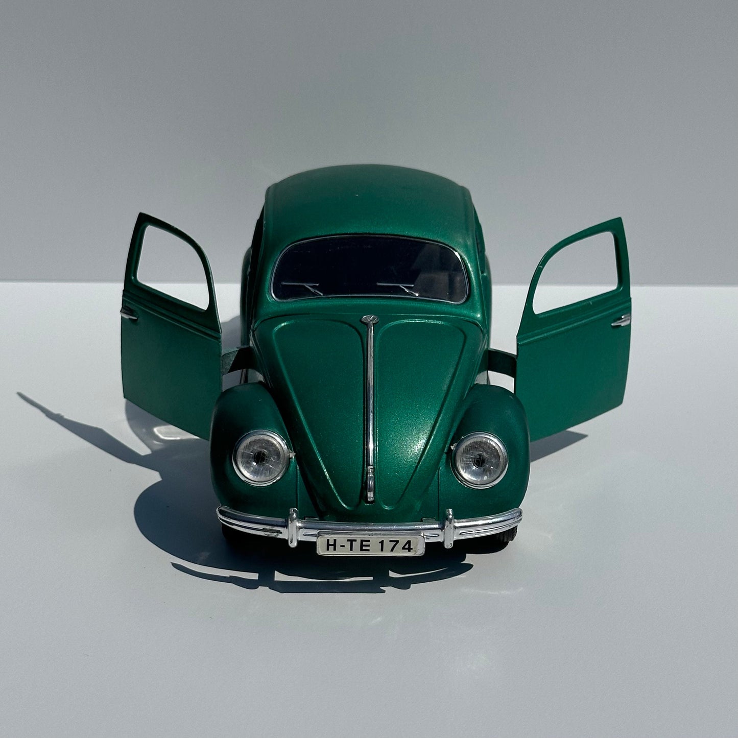 Vintage Die-Cast Model Car of a Green Volkswagen Beetle Echella Solido and Made in France.