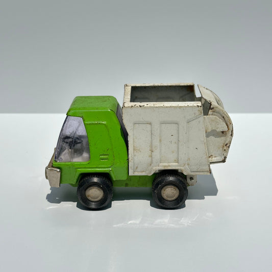 Vintage Green Dump Truck in Pressed Steel by Buddy L. and Made in Japan.