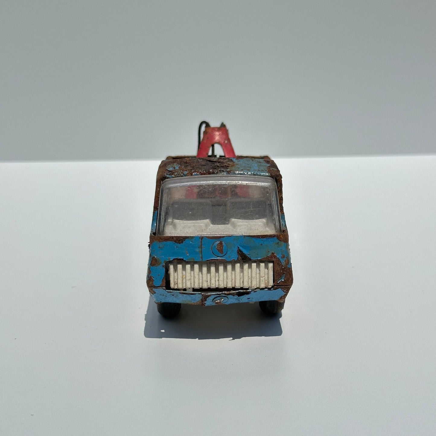 Vintage Blue Tow Truck Die-Cast Car Model Made by Tonka in 1960s.