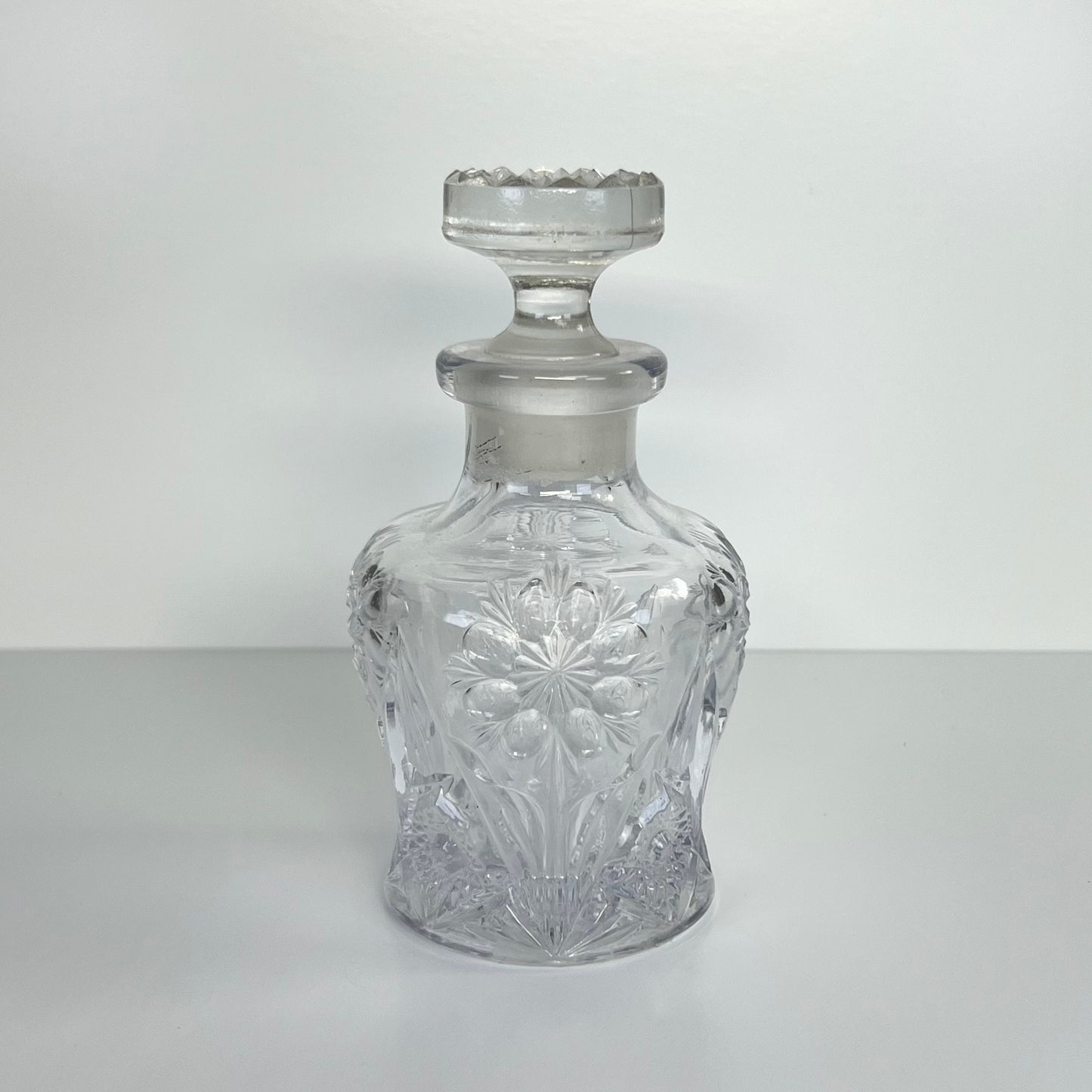 Vintage Perfume or Cologne Bottle with Clear Imperial Pressed Glass in Star Pattern