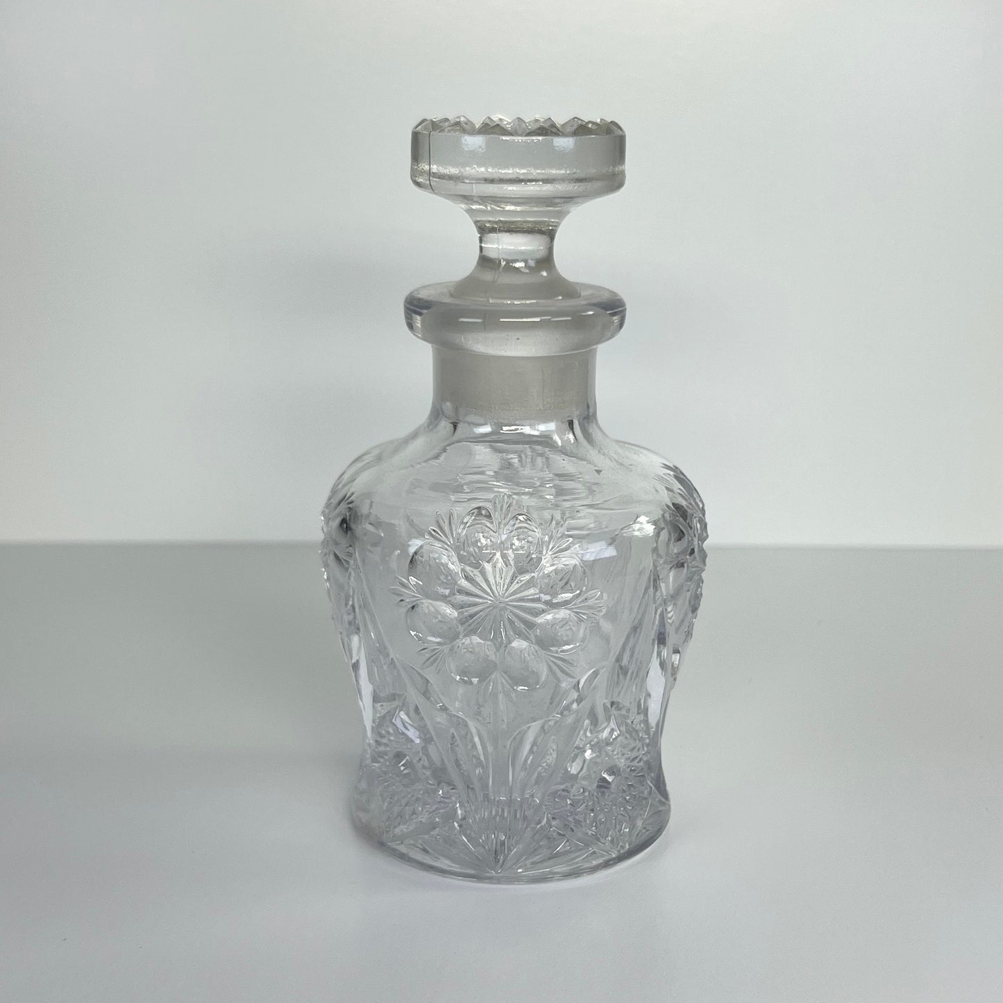 Vintage Perfume or Cologne Bottle with Clear Imperial Pressed Glass in Star Pattern