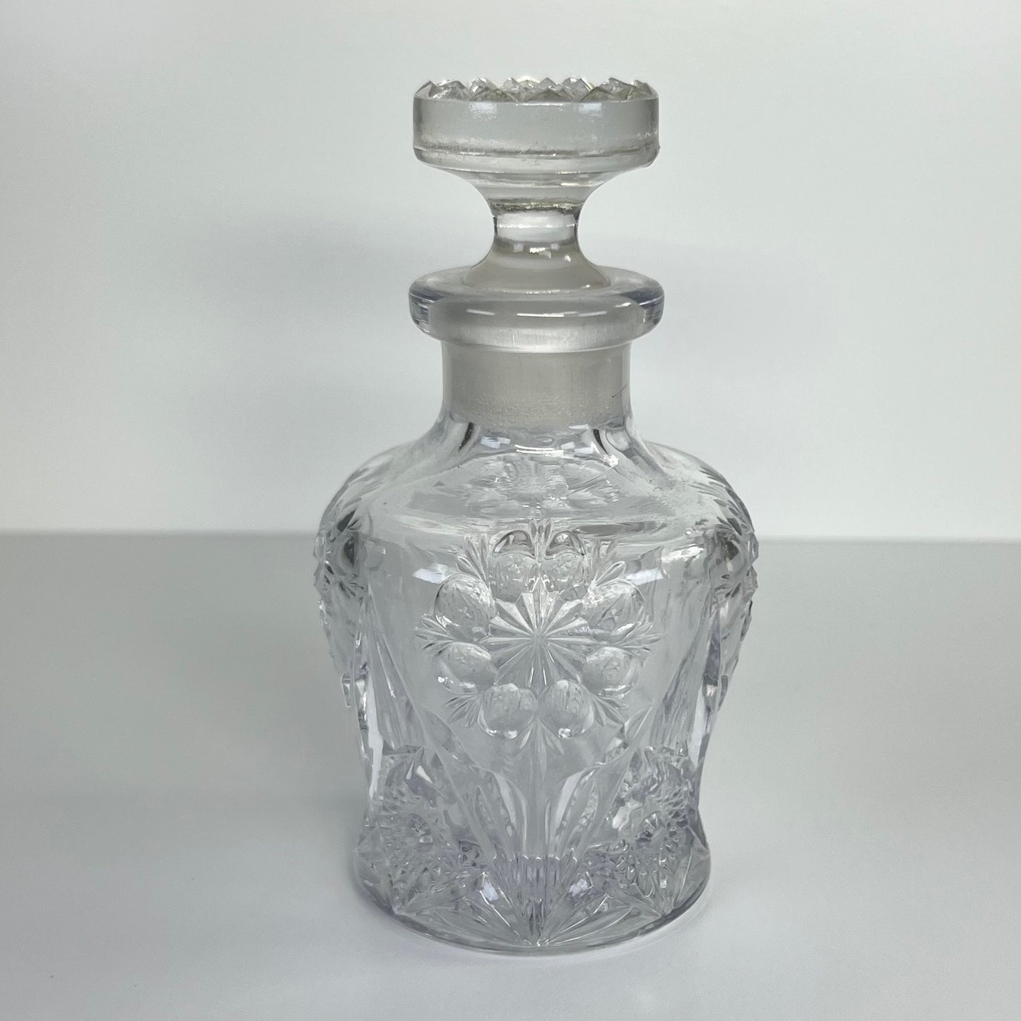 Vintage Perfume or Cologne Bottle with Clear Imperial Pressed Glass in Star Pattern