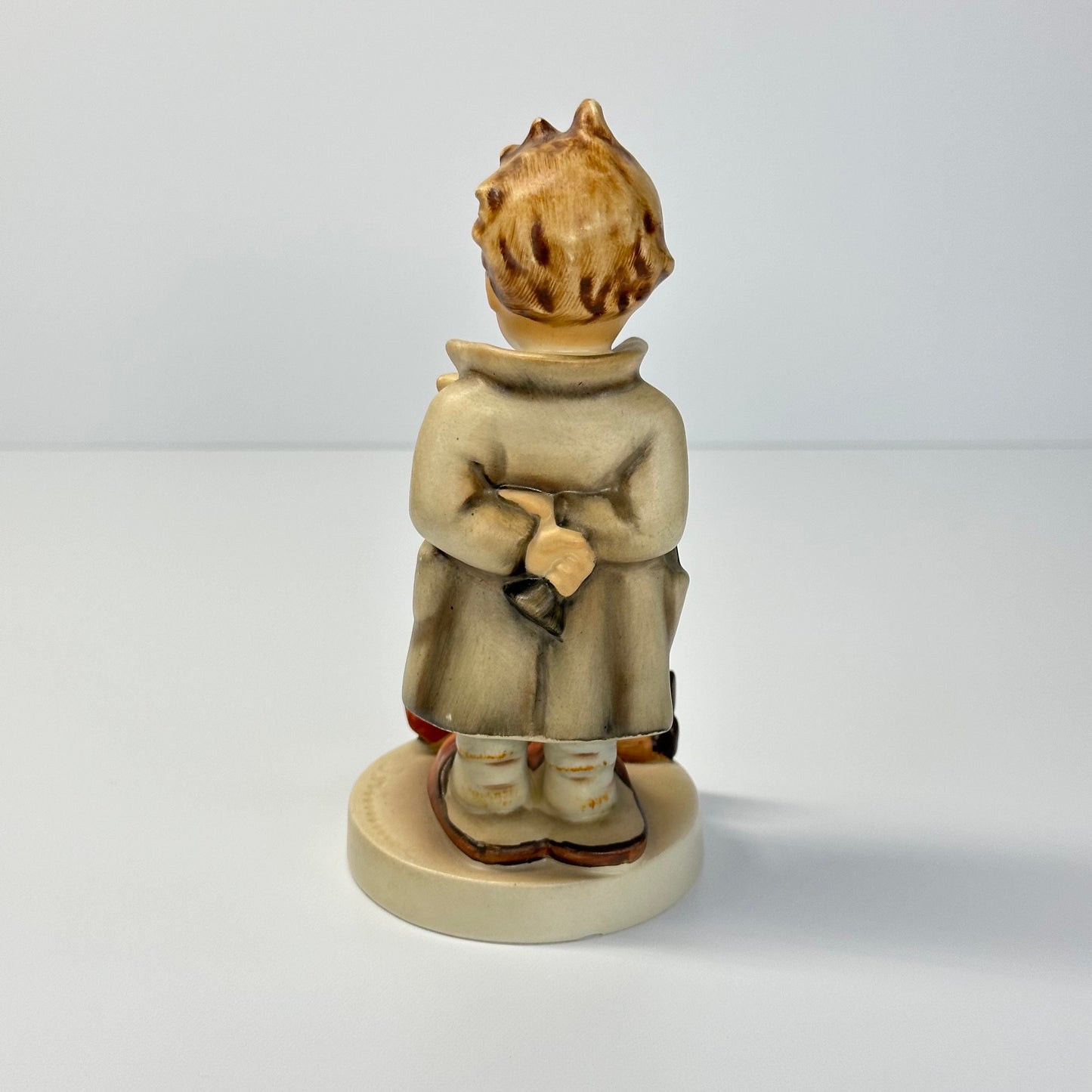 Vintage Hummel Figurine of Doctor with Doll #127 and Made in West Germany.