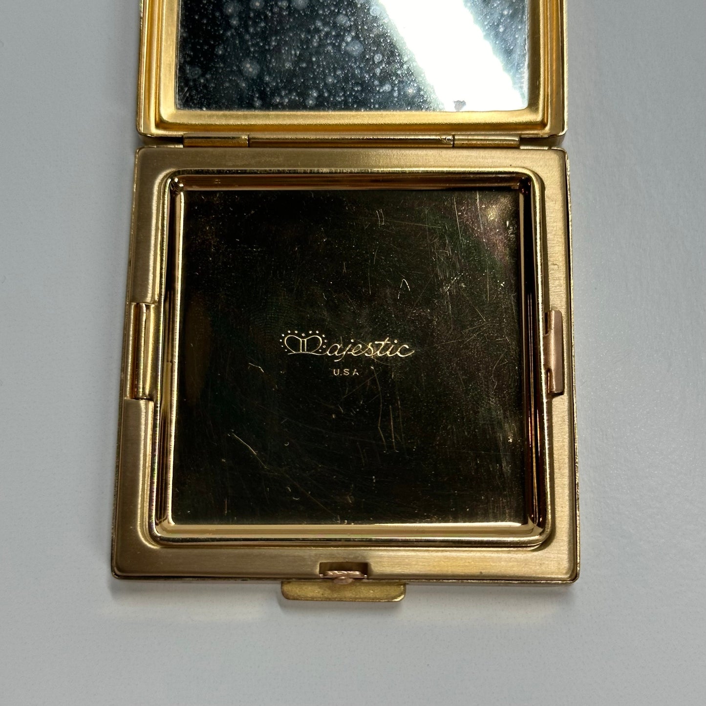 Vintage Compact by Majestic in Gold Textured Design.