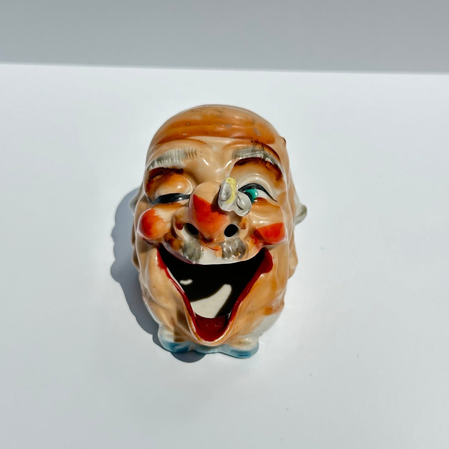 Vintage Ceramic Ashtray of Old Man with Bee on His Nose, Made in Japan.