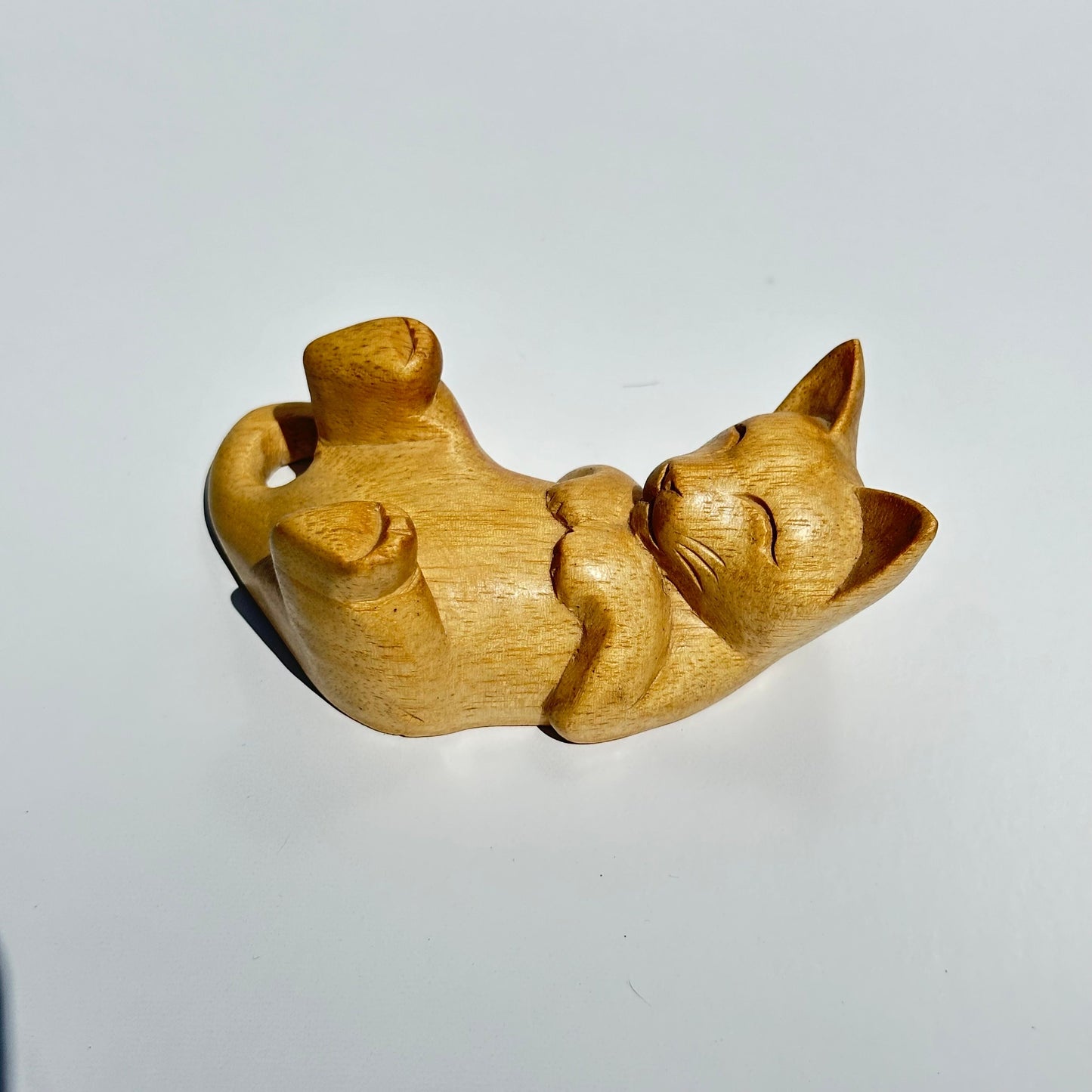 Vintage Wooden Figurine of Hand Carved Cat on It's Back. Adorable!