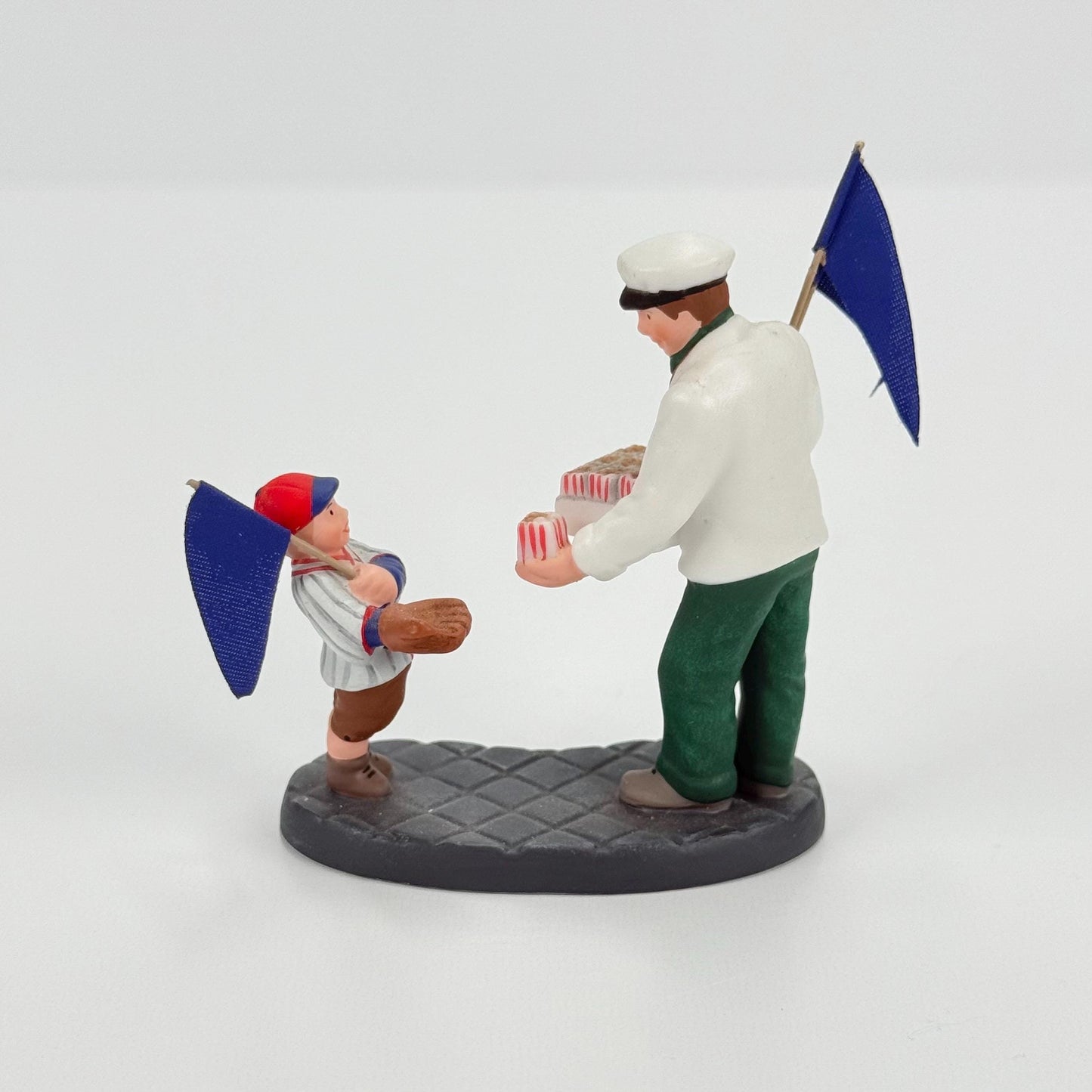 Vintage Department 56 Christmas Village Figurine of Peanuts, Pennants, & Programs