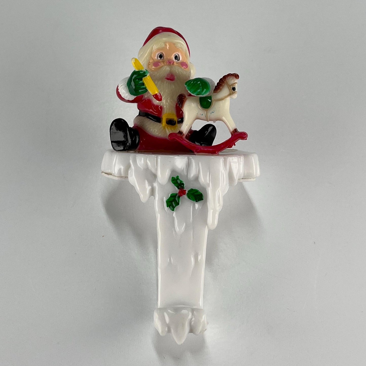 Vintage Stocking Holder of Santa and Rocking Horse