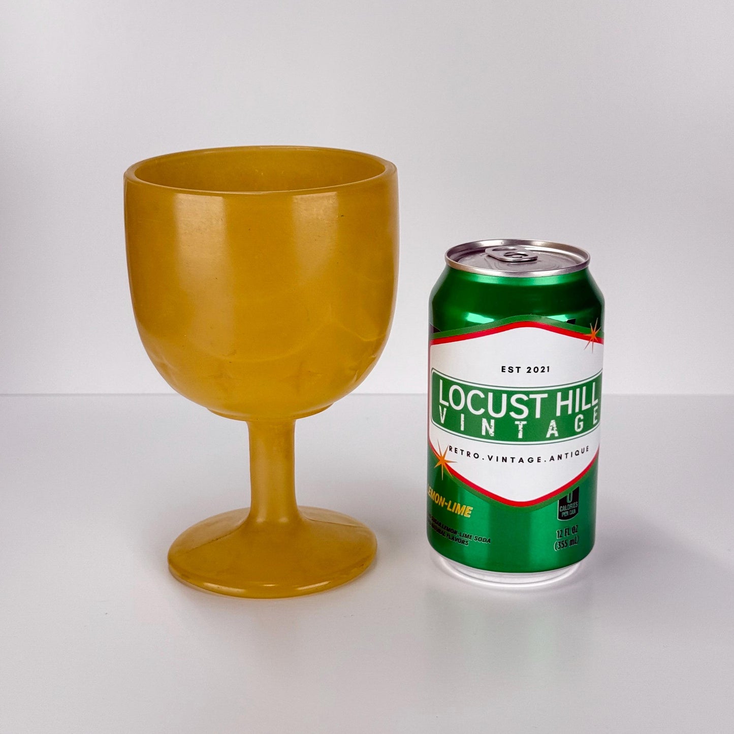 Vintage Carnival Wine Glass in Golden Yellow With Embossed Star Design 1960s