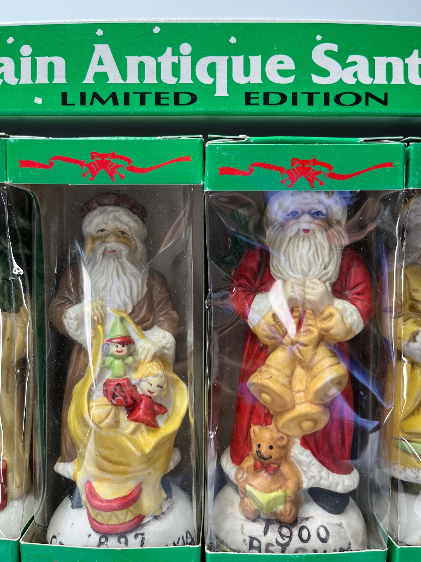 Vintage Porcelain Figurines of Santa by Liberty Bell in Limited Edition 12pc Set