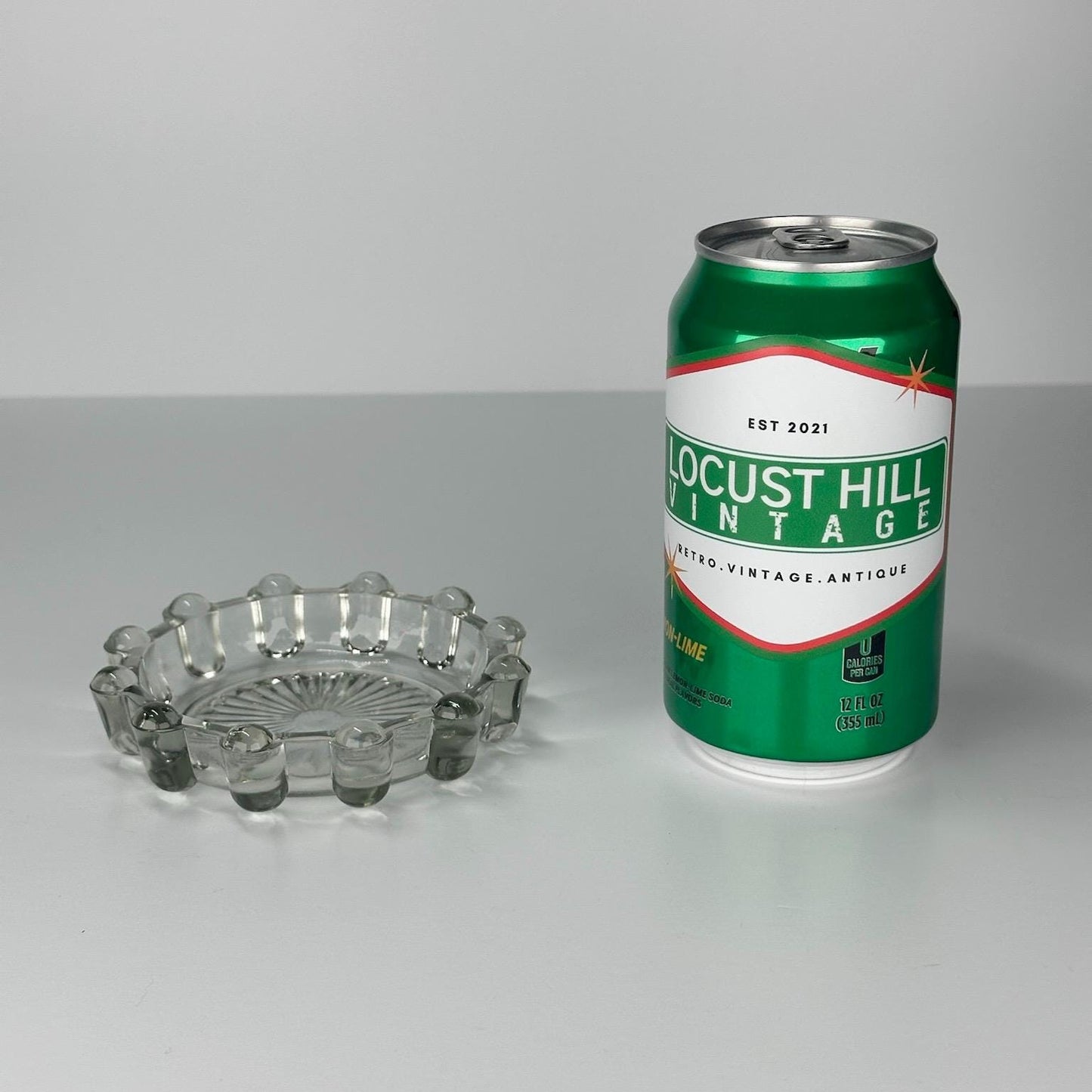 Vintage Glass Ashtray with Bubble Design and Starburst Bottom