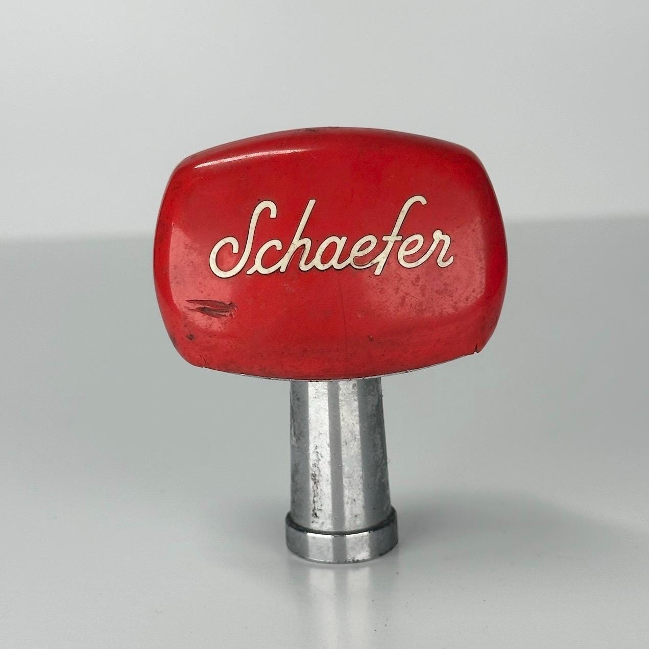 Vintage Beer Pull with Schaefer Lettering and Red Top by The F.&.M. Schaefer Brew Co.