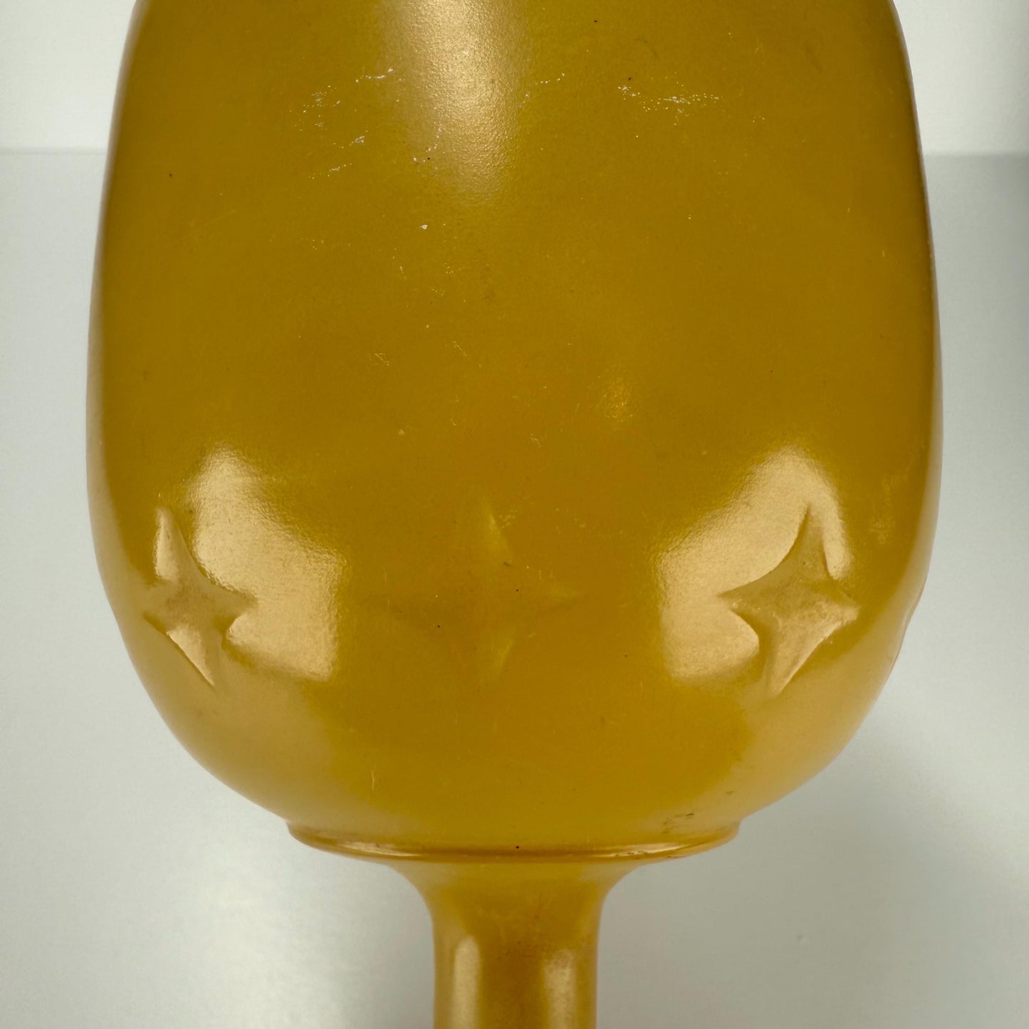 Vintage Carnival Wine Glass in Golden Yellow With Embossed Star Design 1960s